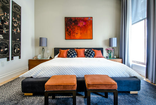 Bohemian bedroom with layered textiles, warm earthy tones, and eclectic decor