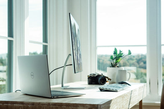 Beautifully styled home office with natural light, organized desk, and inspiring decor