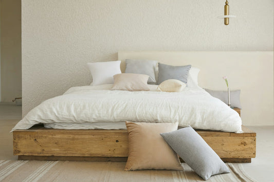 Bohemian bedroom with layered textiles, warm tones and macrame decor